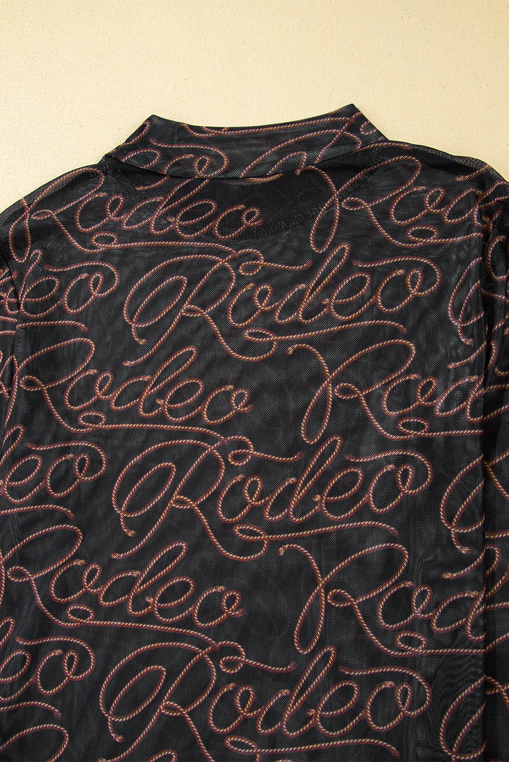 Western Rodeo Printed Mock Neck Long Sleeve Mesh Top in Black